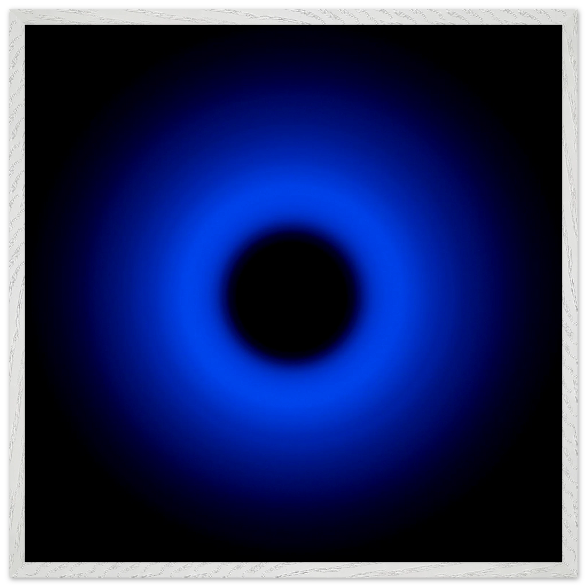 A circular ring of deep blue light surrounds a black center, gradually fading outward into darkness.
