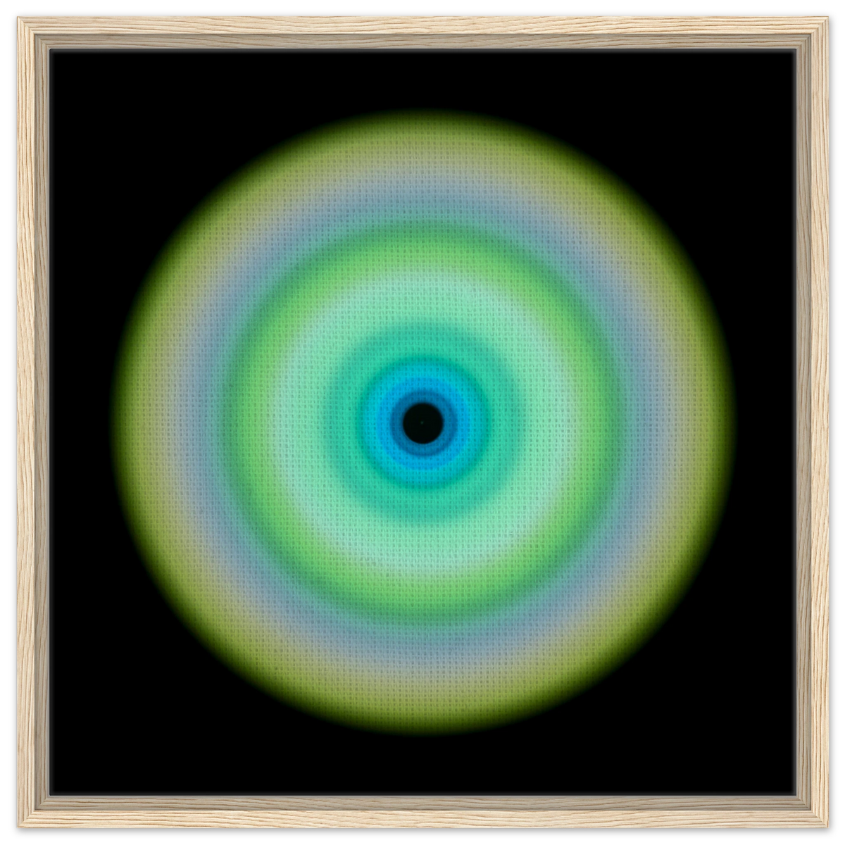 A circular form with concentric rings transitioning from pale yellow-green on the outer edge through lime green and aqua to cobalt blue around a small dark center.