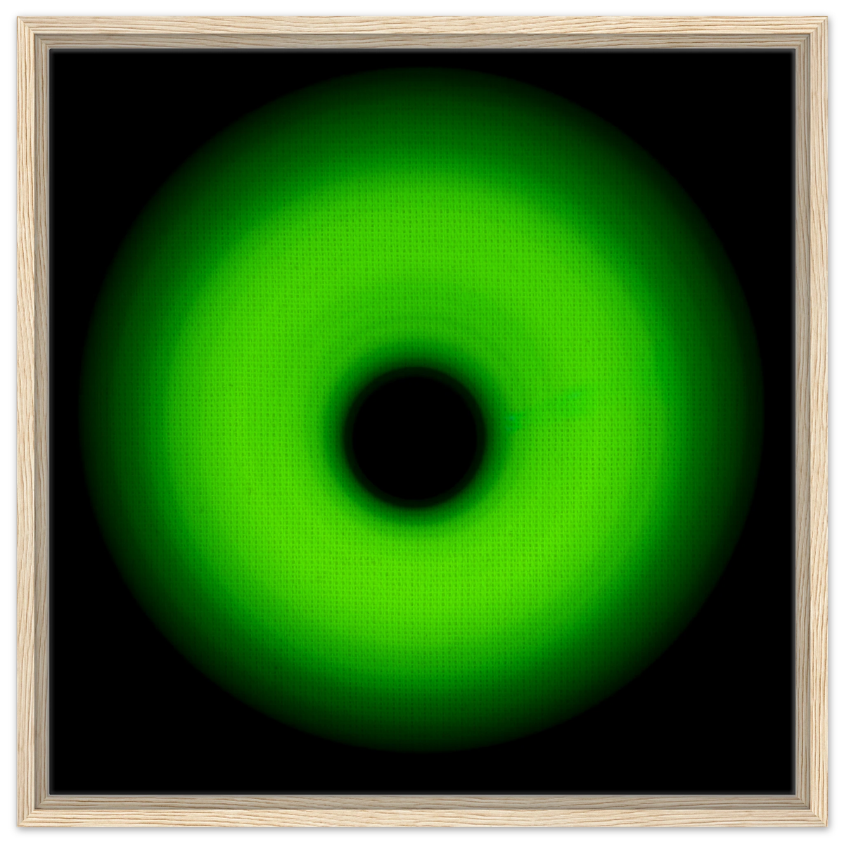 A circular ring of bright lime green light with concentric circles and a glowing center core against a black background.