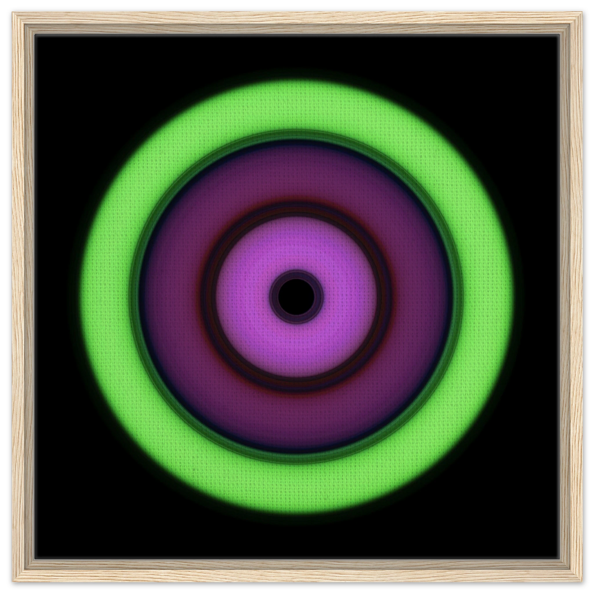 Circular aperture shape with concentric rings transitioning from bright lime green on the outside through purple tones to bright magenta around a small black center.