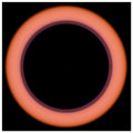 A circular image with a large black center surrounded by a thin violet ring that transitions to coral orange at the outer edges.