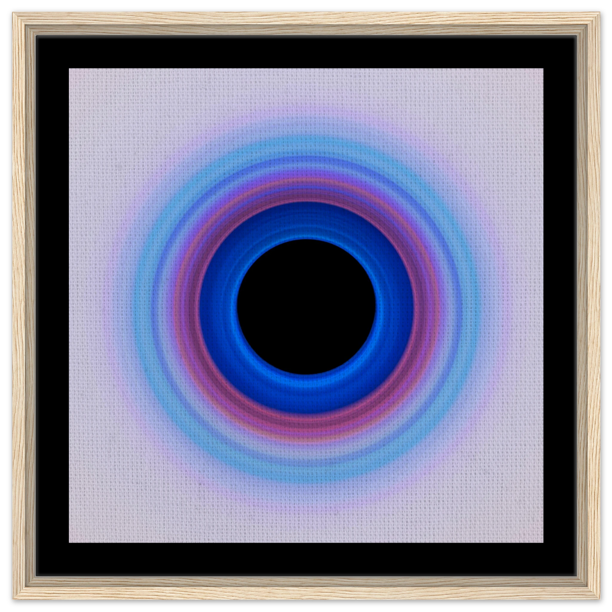 A circular ring with deep blue center transitioning through purple and magenta to pale lavender at the edges, surrounding a black void.