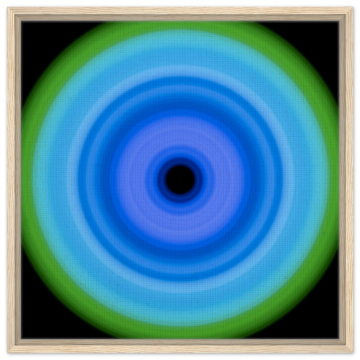 A circular pattern with concentric rings transitioning from a black center through various shades of blue to a lime green outer edge.