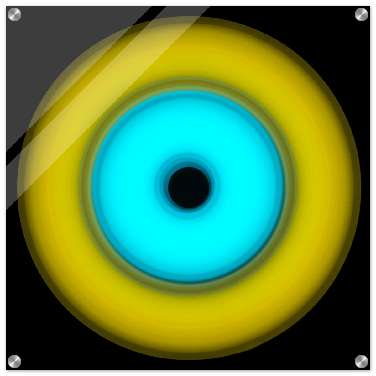 A circular aperture shape with bright yellow outer ring, electric cyan inner circle, and small black center hole against a black background.