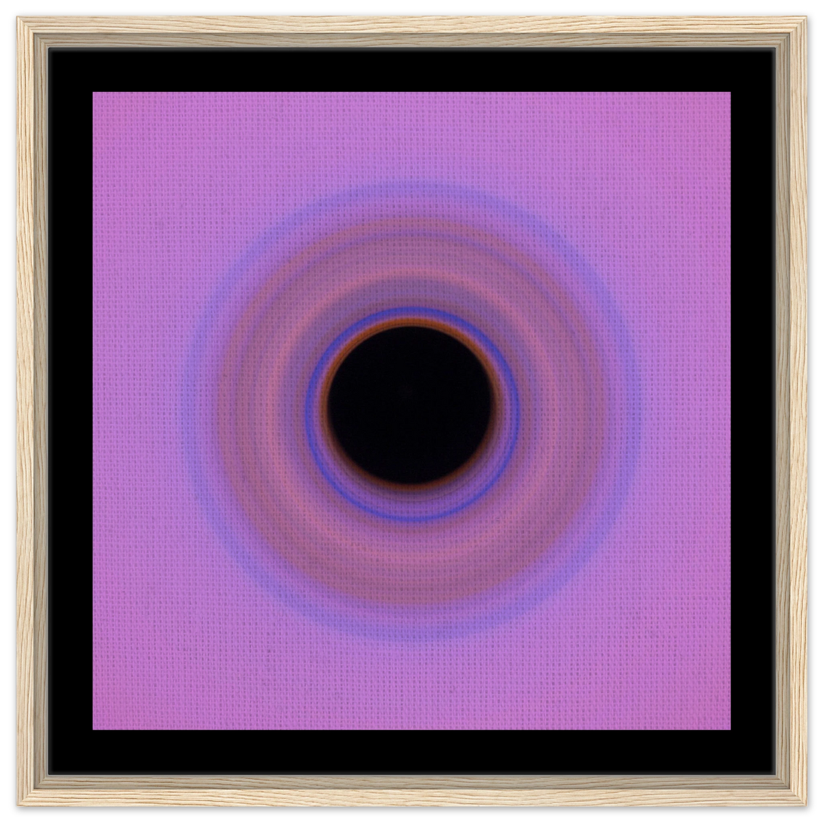 A circular swirl with black center surrounded by concentric rings transitioning from orange through blue and purple to pink at the outer edges.