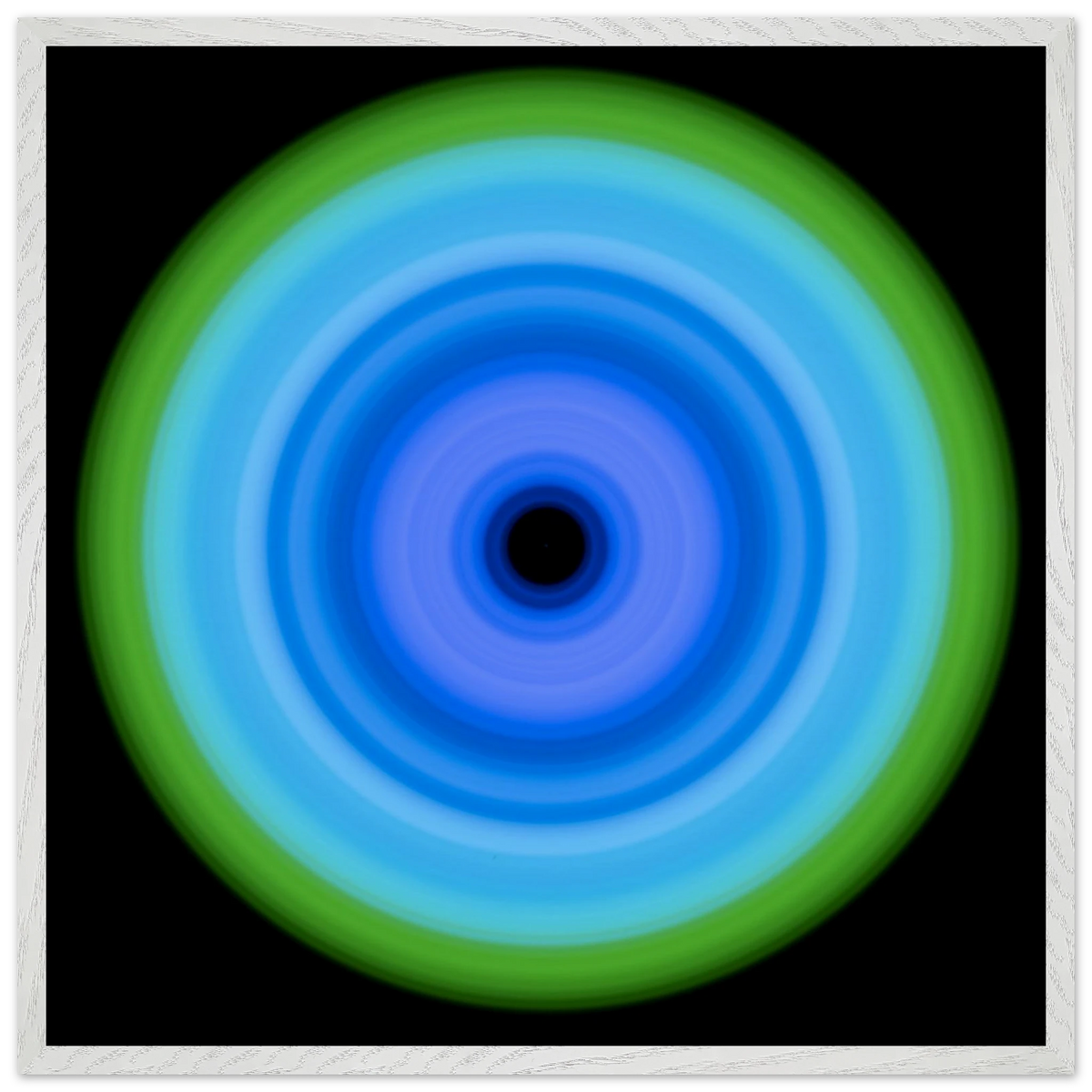 A circular pattern with concentric rings transitioning from a black center through various shades of blue to a lime green outer edge.